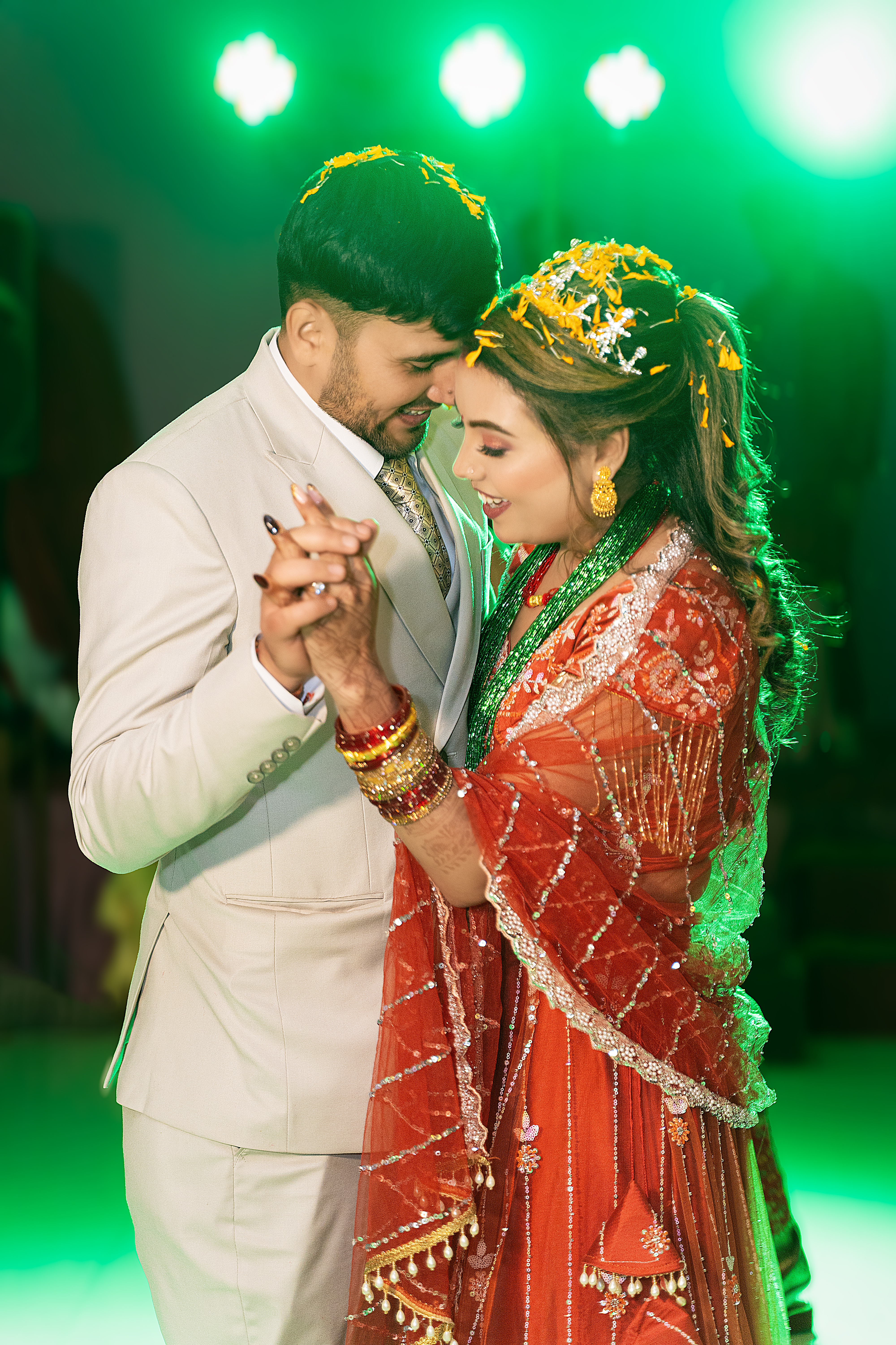 Engaged couple portrait in front of white palace building